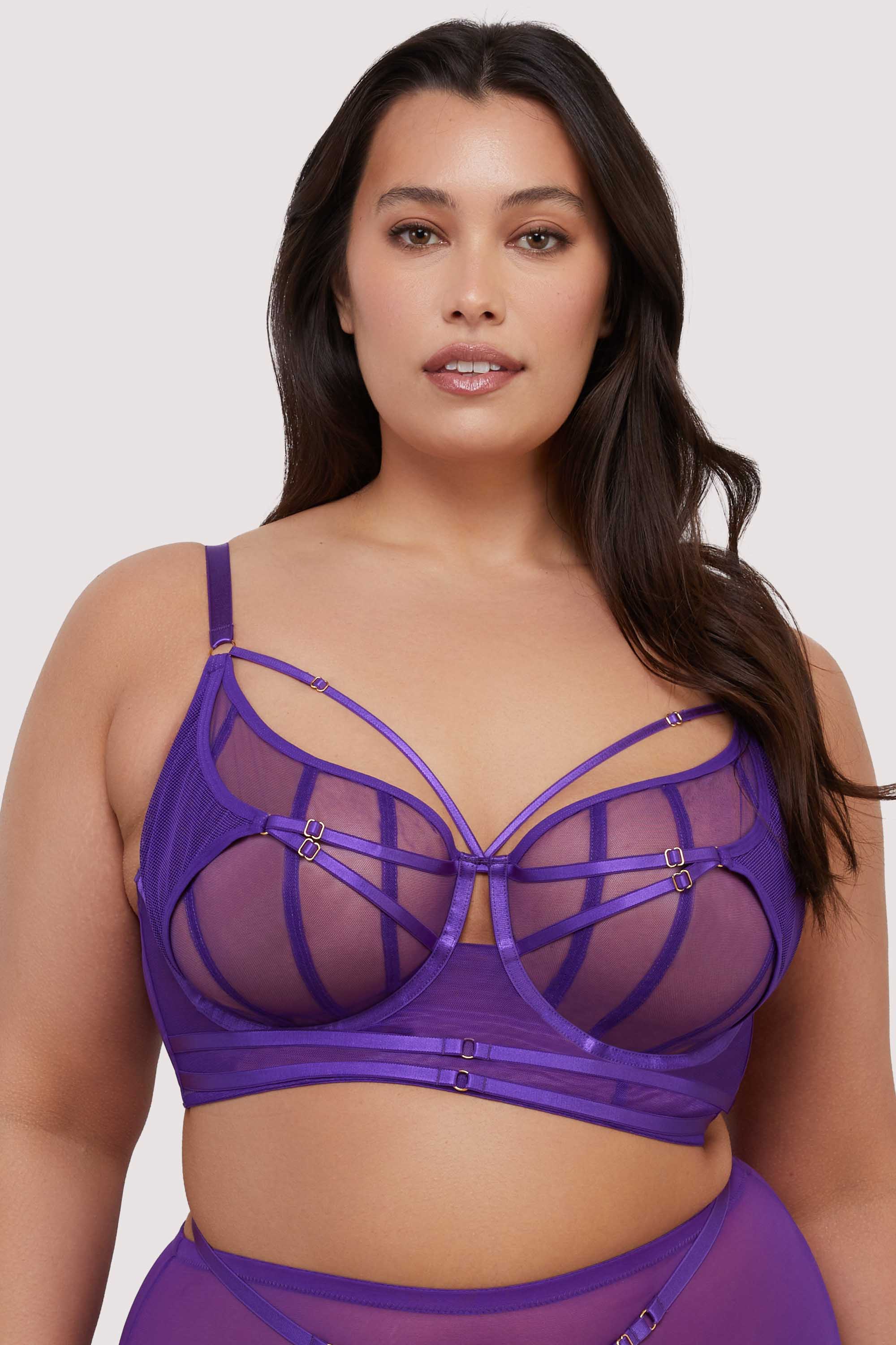 model wears purple mesh bra with straps