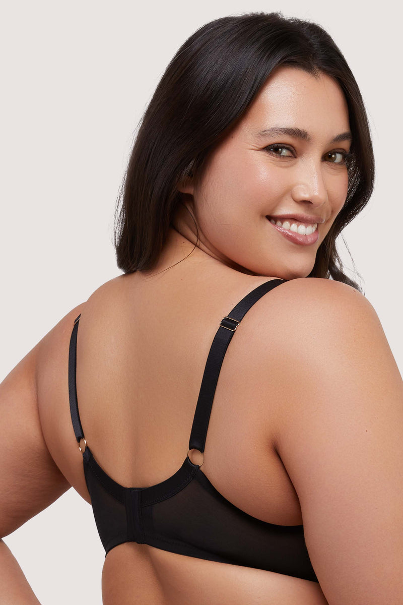 model shows hook and eye fastening mesh bra back