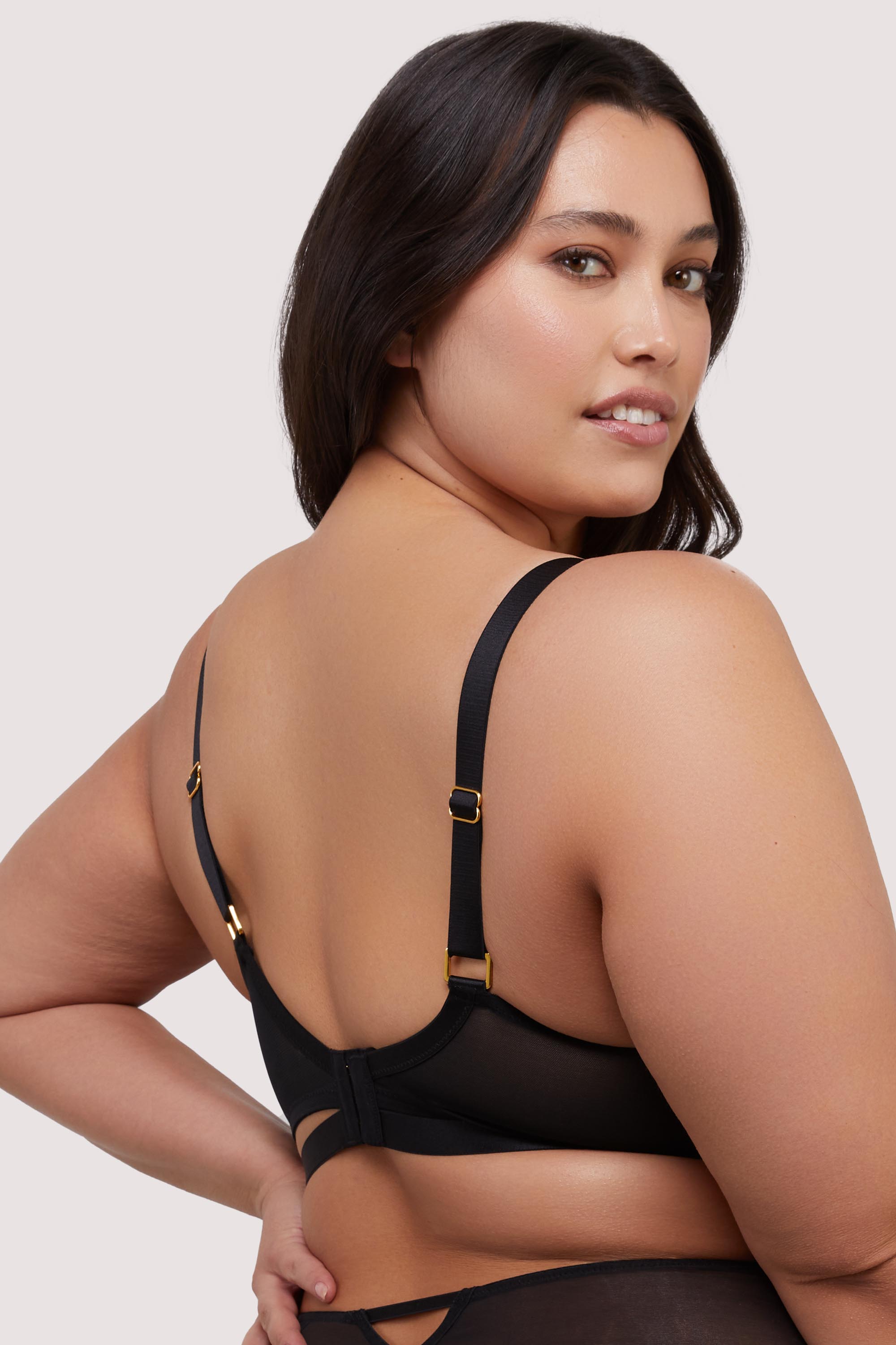 model shows black mesh hook and eye fastening bra back