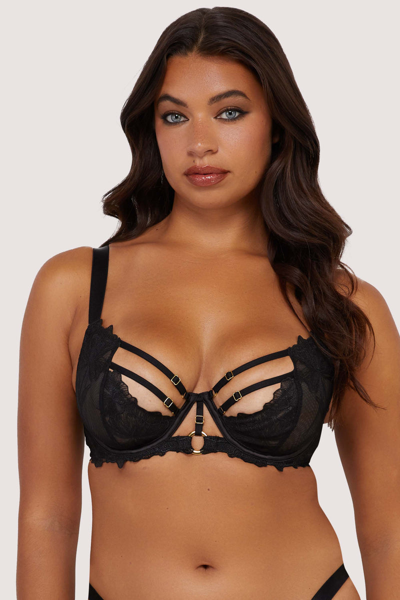 Model wears sexy black bra with thick shoulder straps