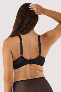 Model shows back of black padded plunge bra with  adjustable straps hook and eye fastening longline underband