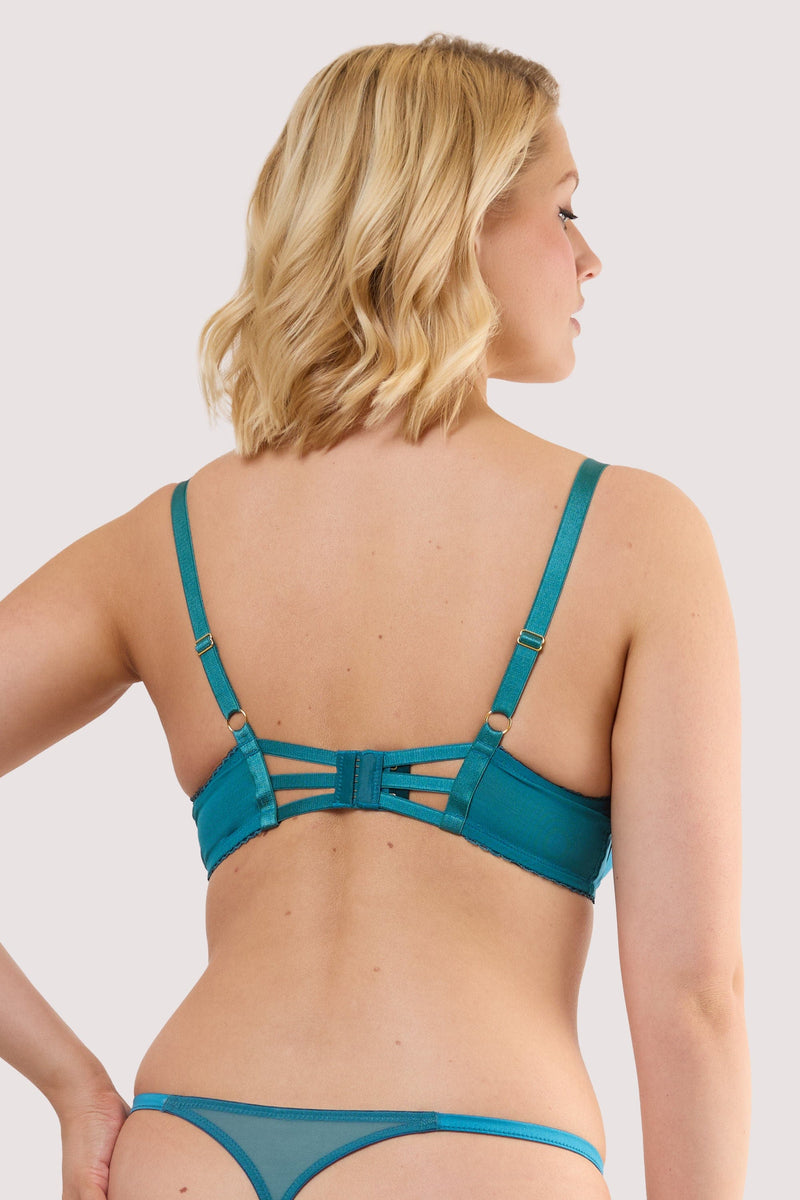 Model shows the back of a mariposa teal butterfly embroidery bra with adjustable satin shoulder straps and hook-and-eye fastening back.