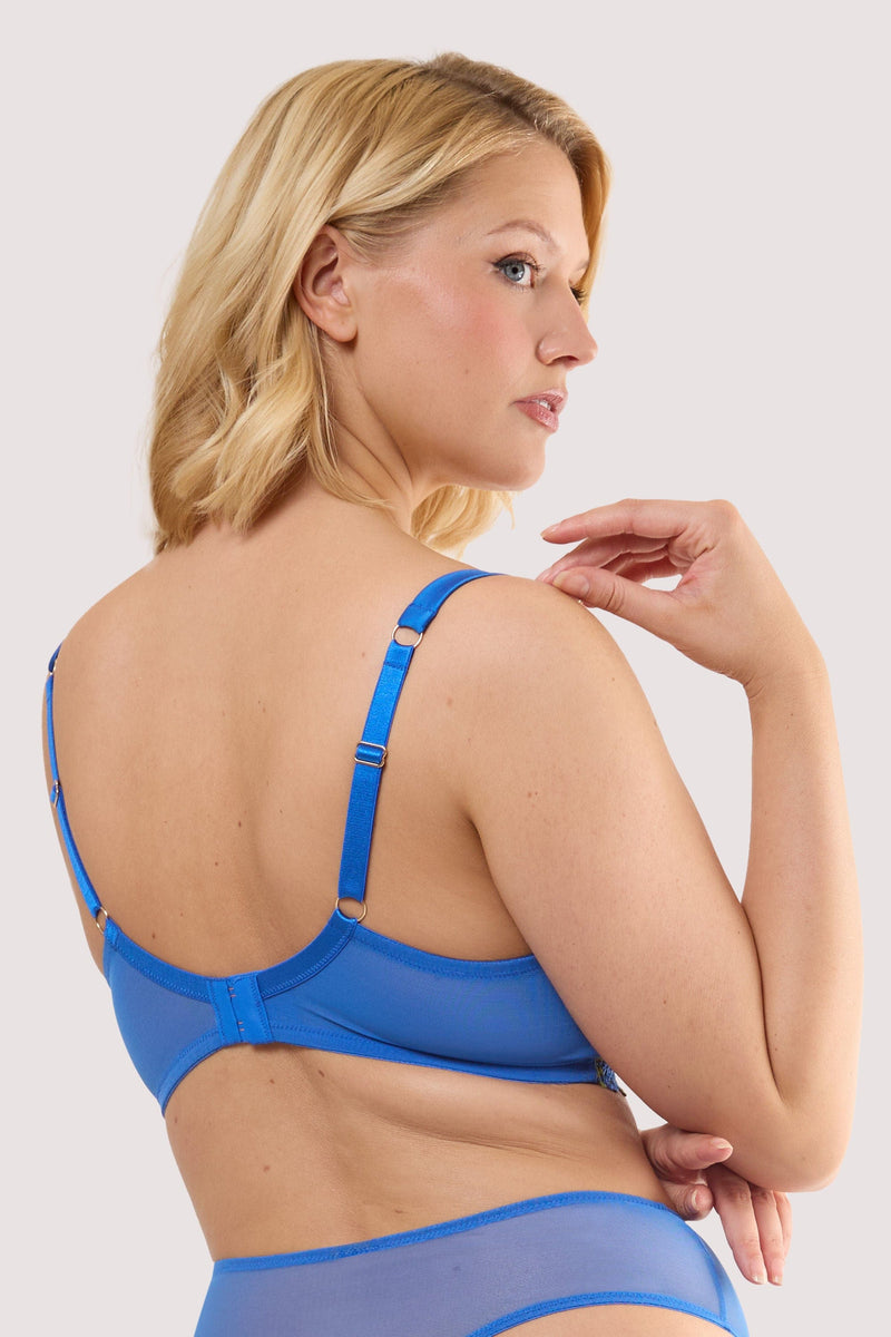 Model shows the back of a hyacinth blue rose embroidery plunge bra with gold-tone hook-and-eye fastening.