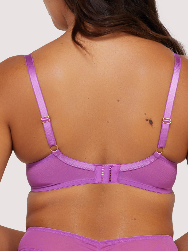 Model shows adjustable shoulder straps and hook and eye fastening back of purple plunge bra