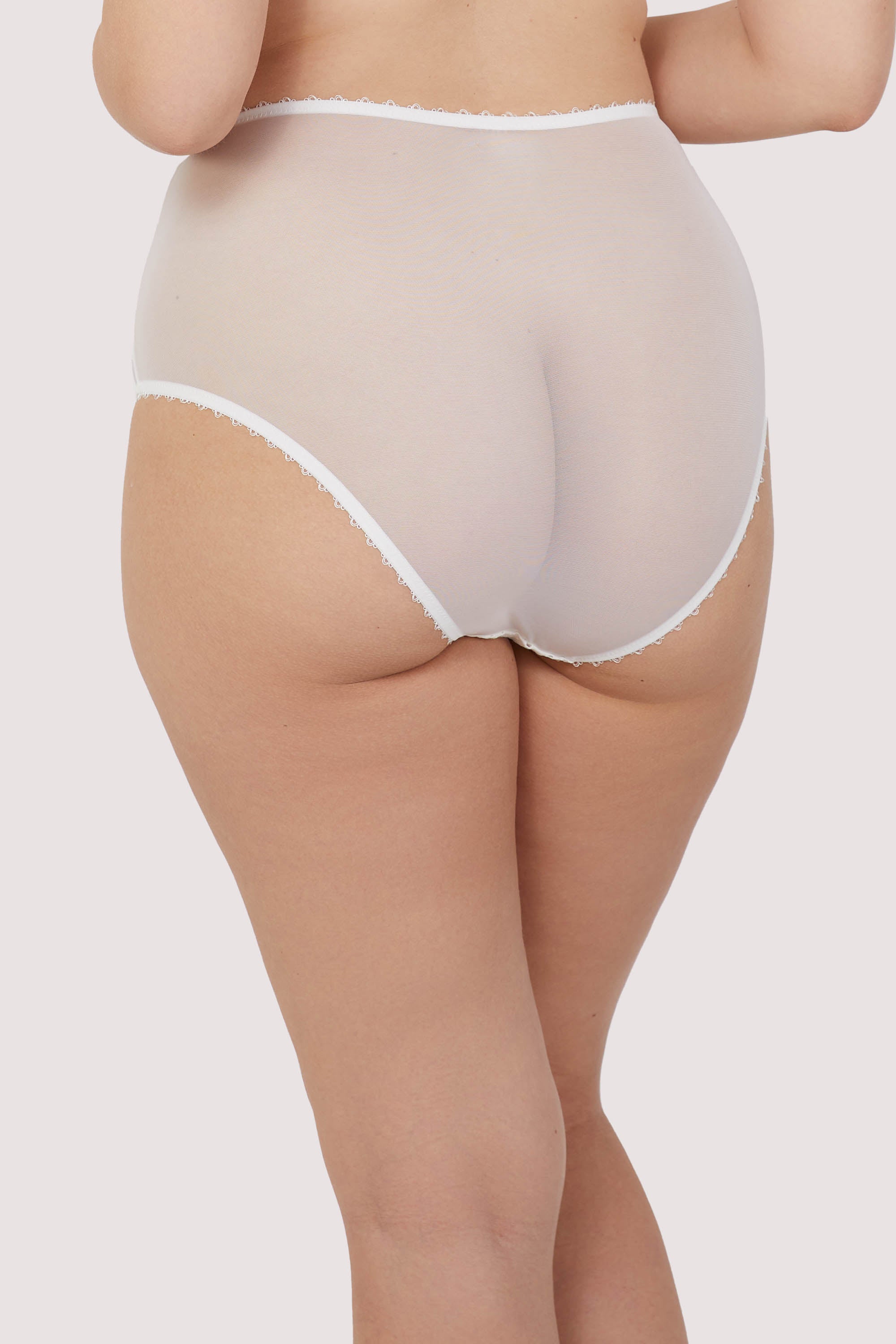 Model shows white mesh full back of broderie anglaise high waist brief