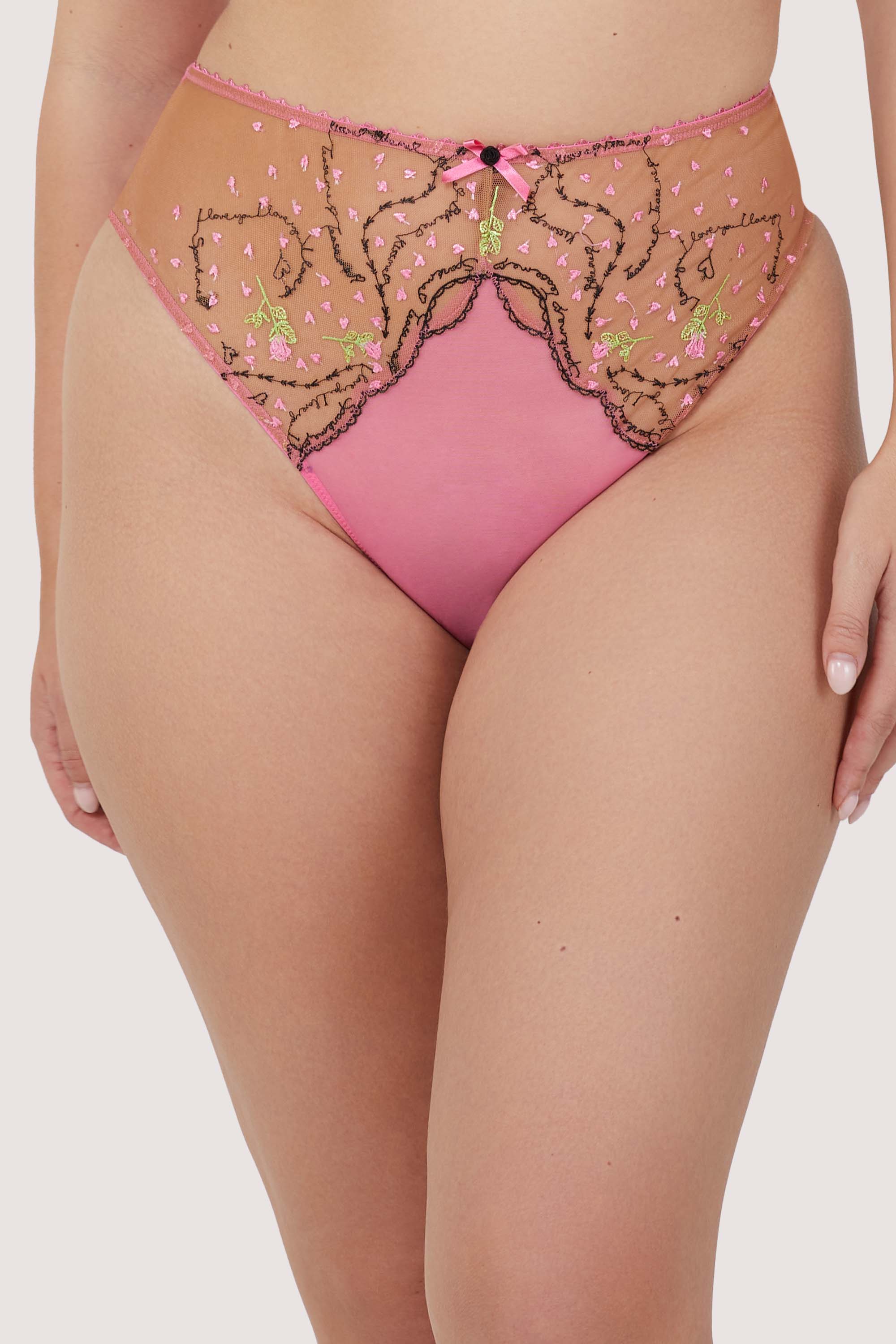 Model wears hot pink and nude embroidered mesh high waist thong