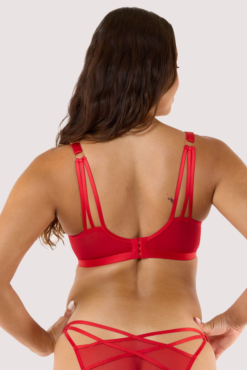 Model showing back of red deco embroidered plunge bra, showcasing its intricate design and vibrant color.