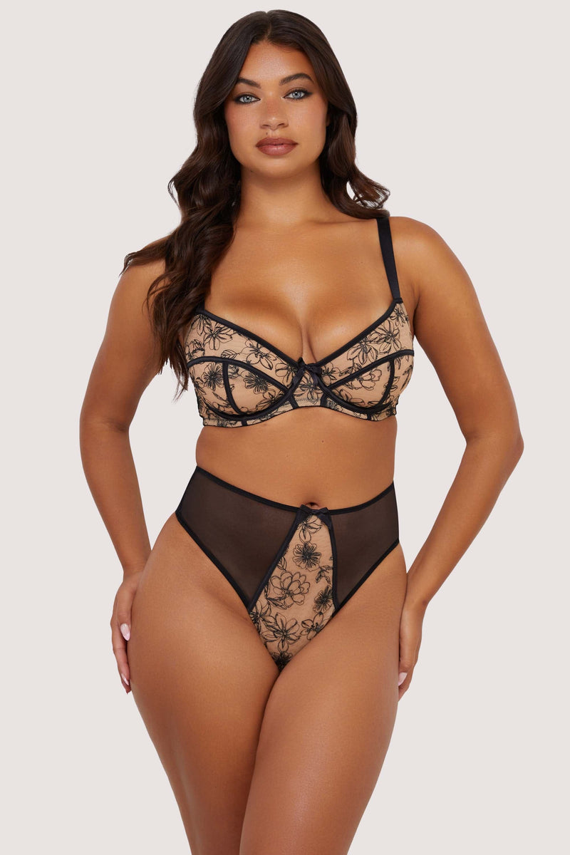 Model wears Contrast Black Embroidery Bra and High Waisted  Thong set, featuring nude mesh with black floral embroidery and supportive balconette underwire cups